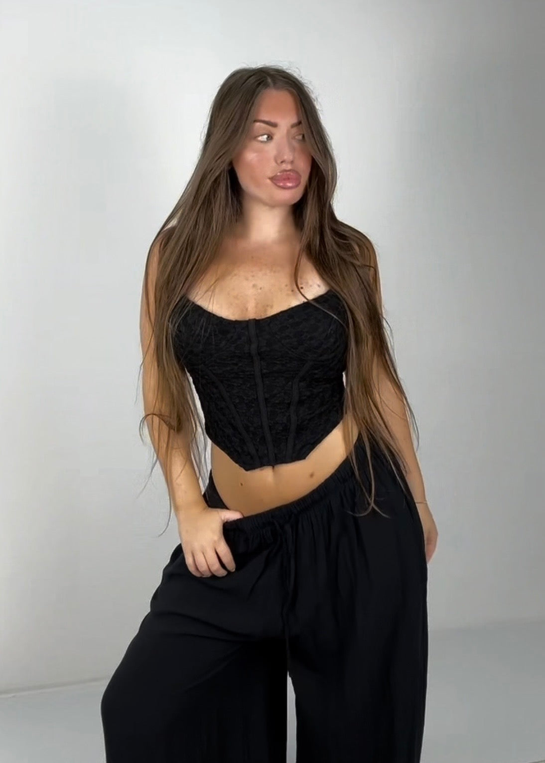 Top corsetto macramé nero