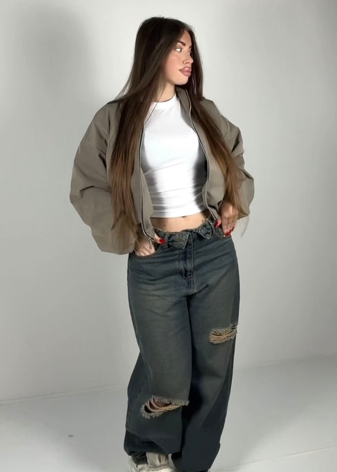 Jeans risvolto rotture sabbiato