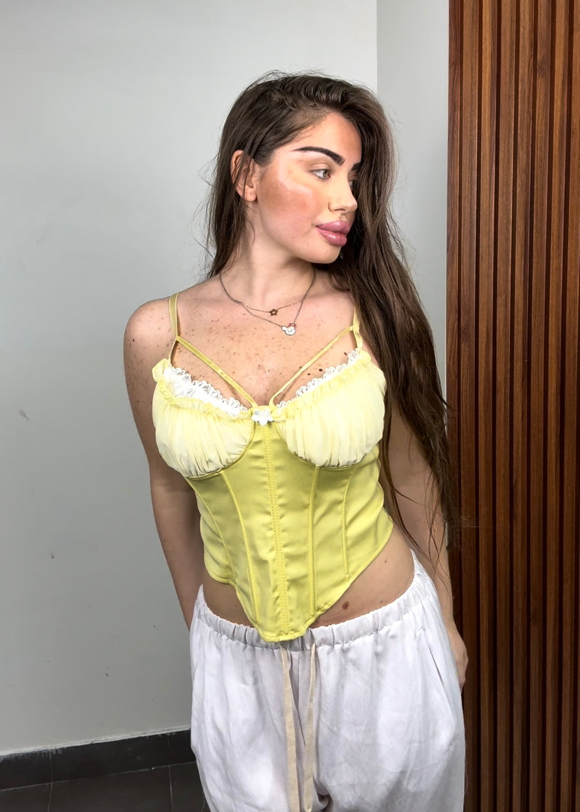 Top Corsetto dettagli in pizzo